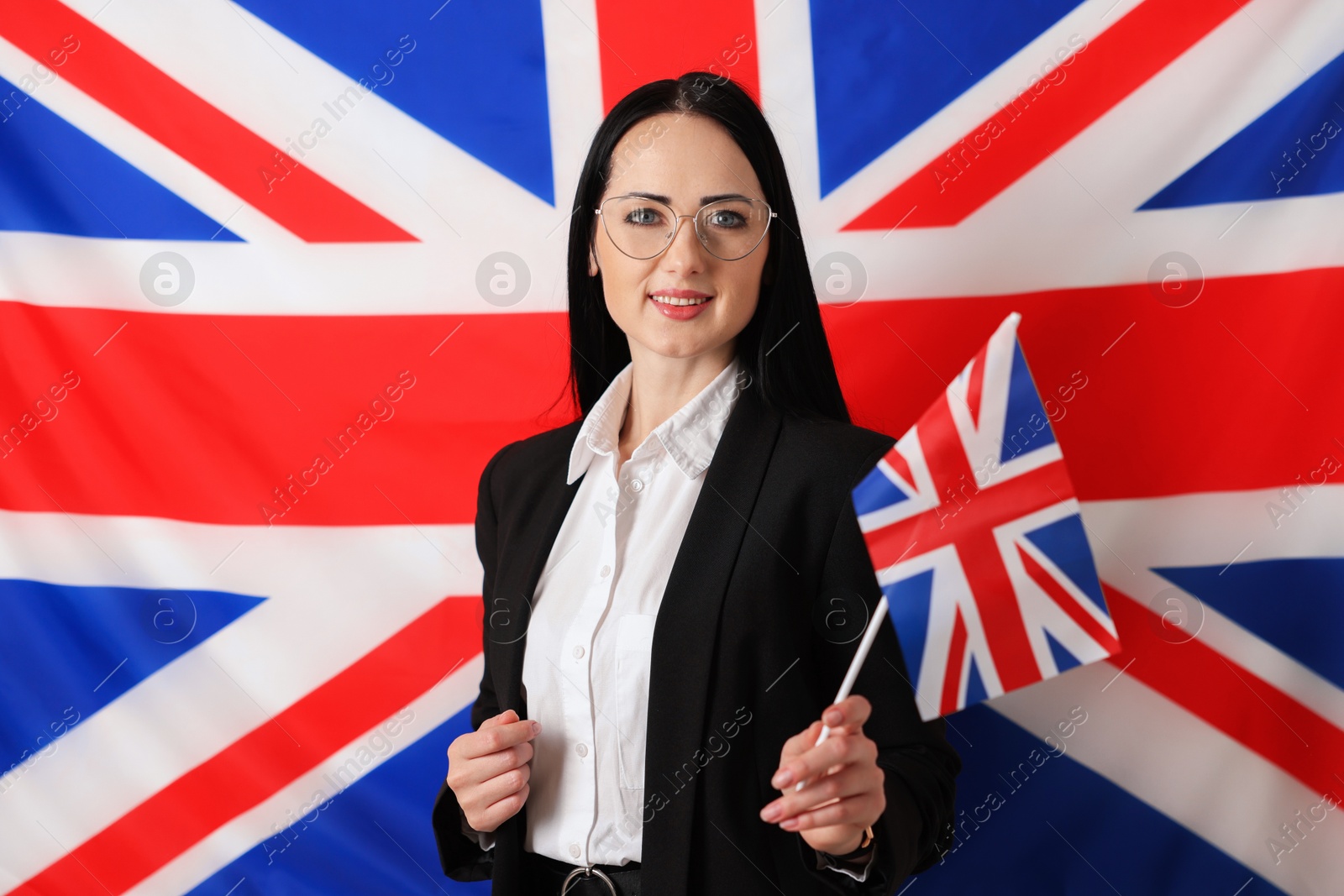 Photo of Portrait of English teacher against UK flag