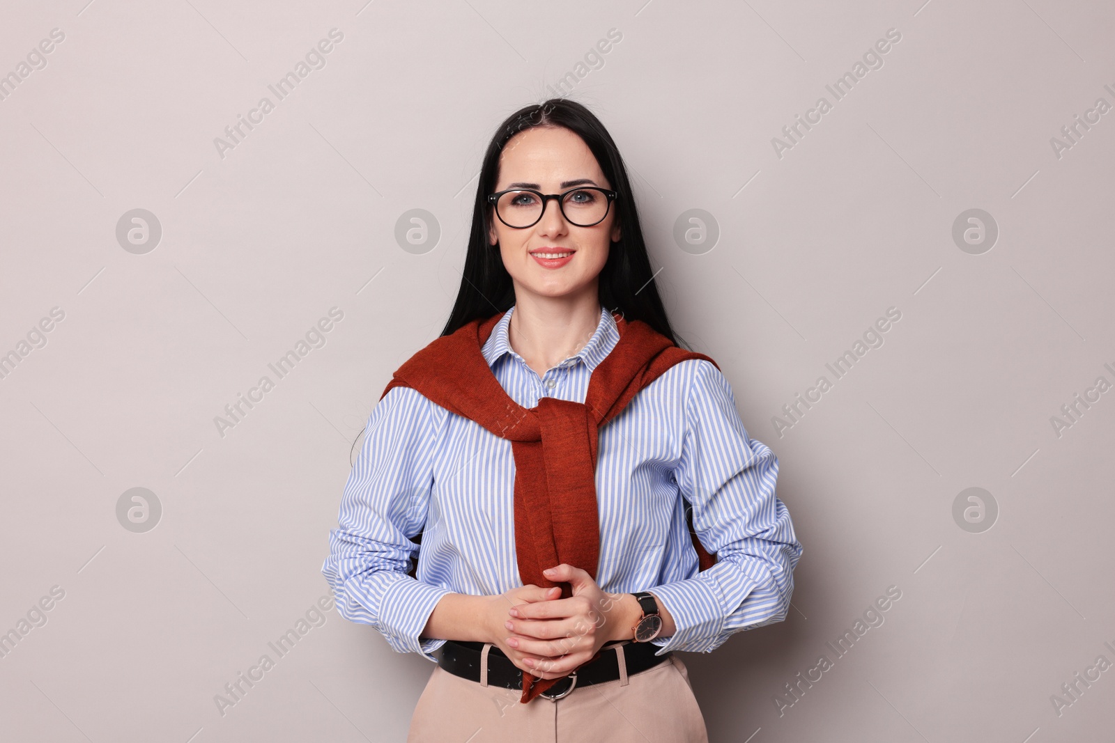 Photo of Portrait of English teacher on light grey background