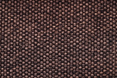 Photo of Texture of rough fabric as background, top view