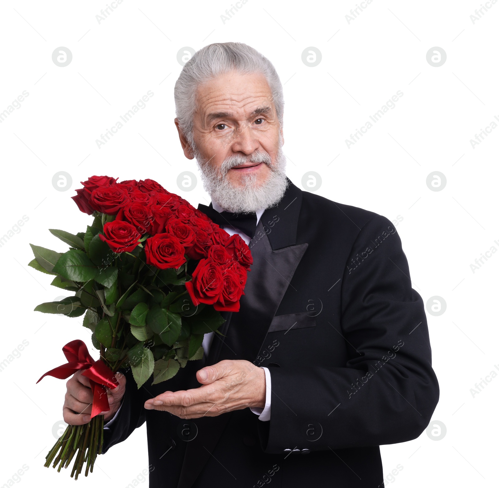 Photo of Senior man with bouquet of red roses on white background