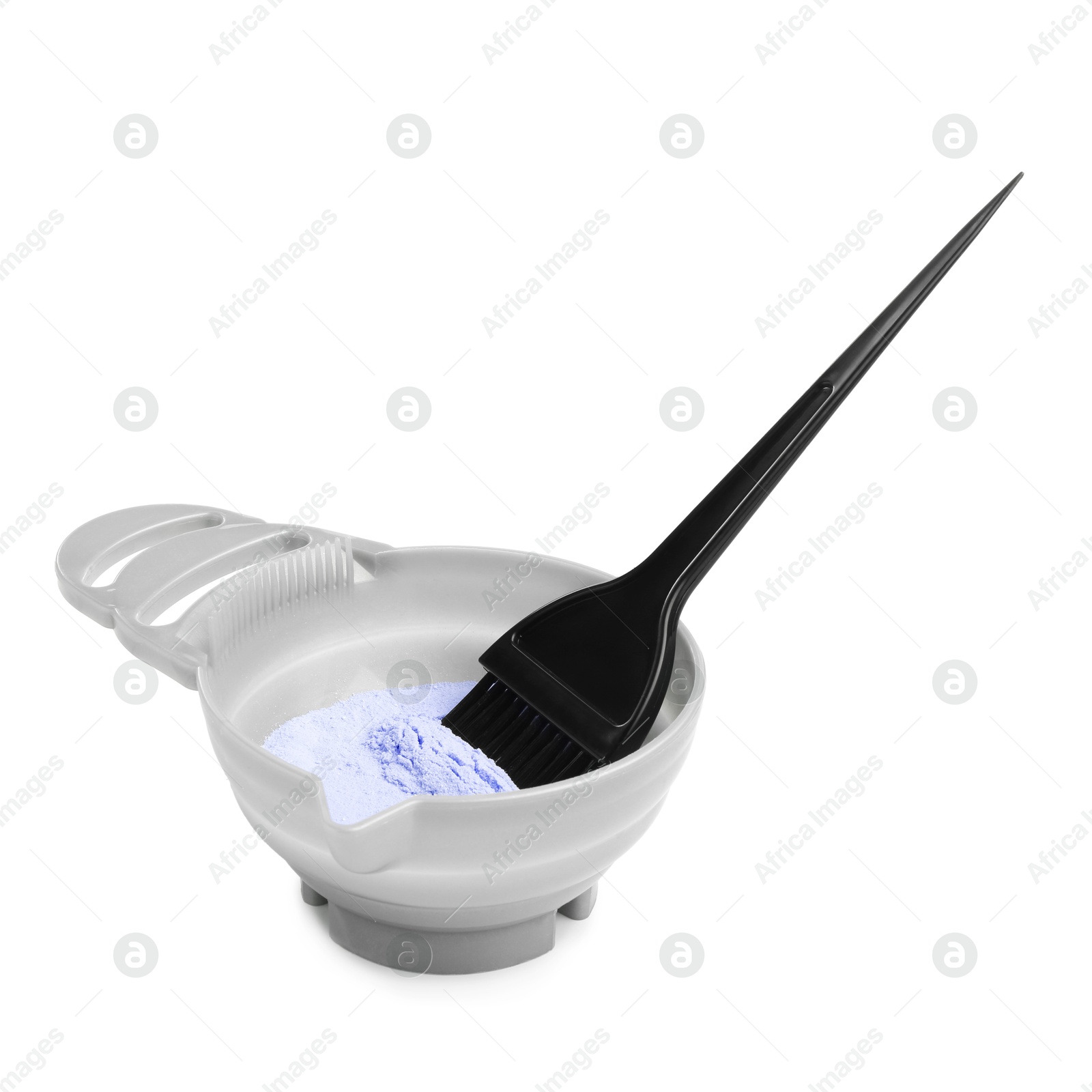 Photo of Bowl with hair bleaching powder and brush isolated on white