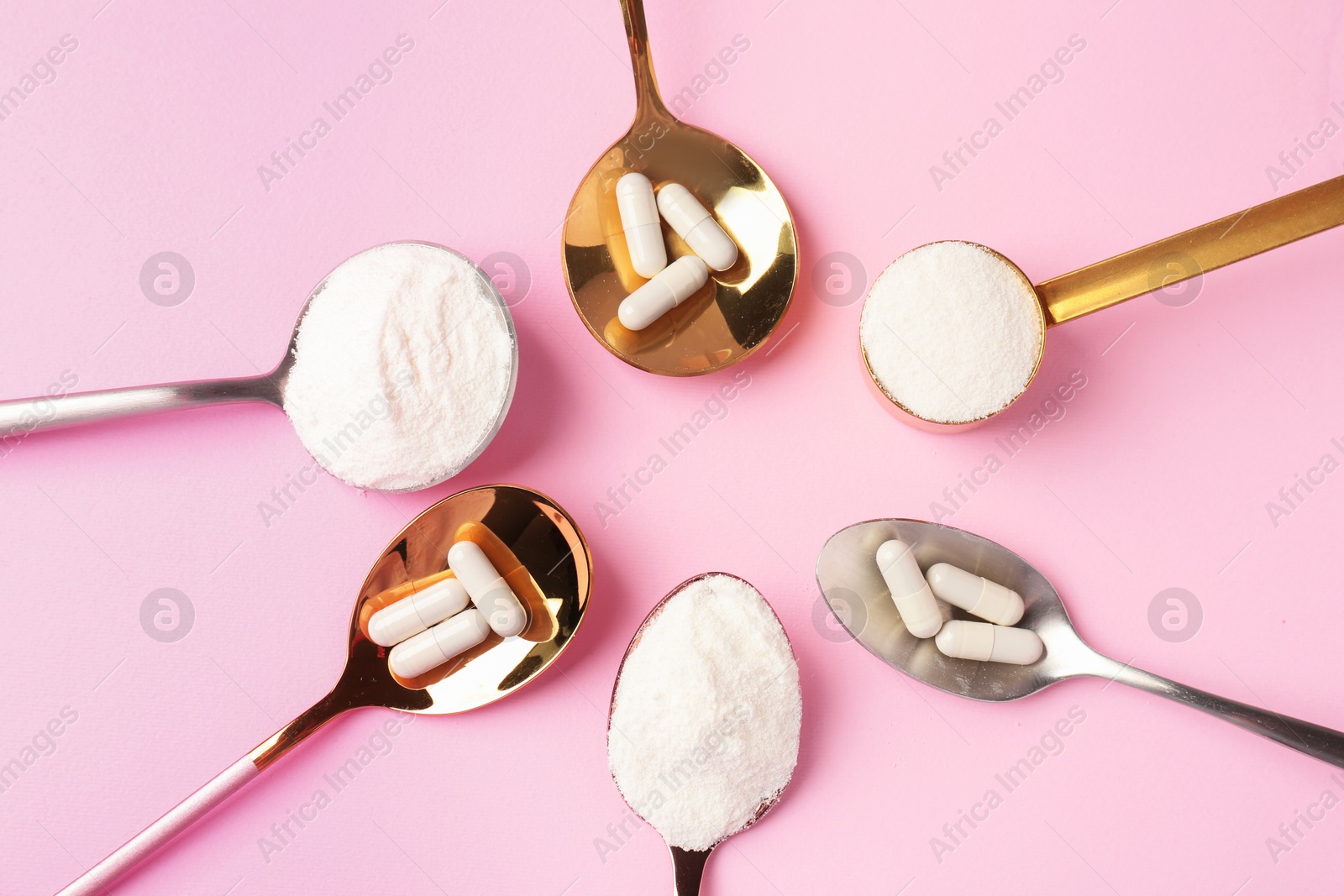 Collagen powder and pills on pink background, flat lay. Food supplement Photo of Collagen powder and pills on pink background, flat lay. Food supplement