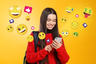 Image of Social media. Happy teenage girl using mobile phone on orange background. Different notification signs and emojis near gadget