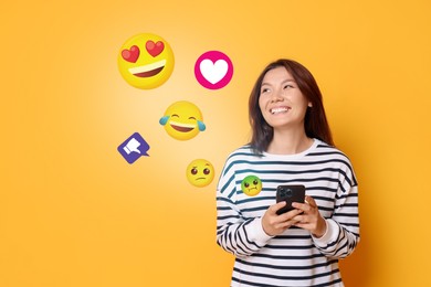 Image of Social media. Happy woman using mobile phone on orange background. Different notification signs and emojis near gadget