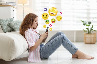 Image of Social media. Teenage girl using mobile phone at home. Different notification signs and emojis near gadget