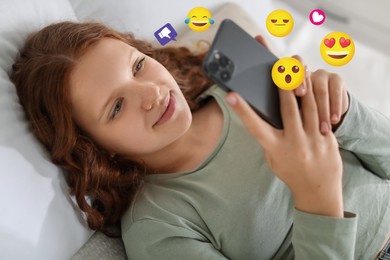 Image of Social media. Teenage girl using mobile phone at home. Different notification signs and emojis near gadget