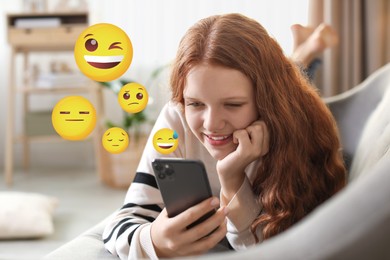 Image of Social media. Happy teenage girl using mobile phone at home. Different emojis near gadget