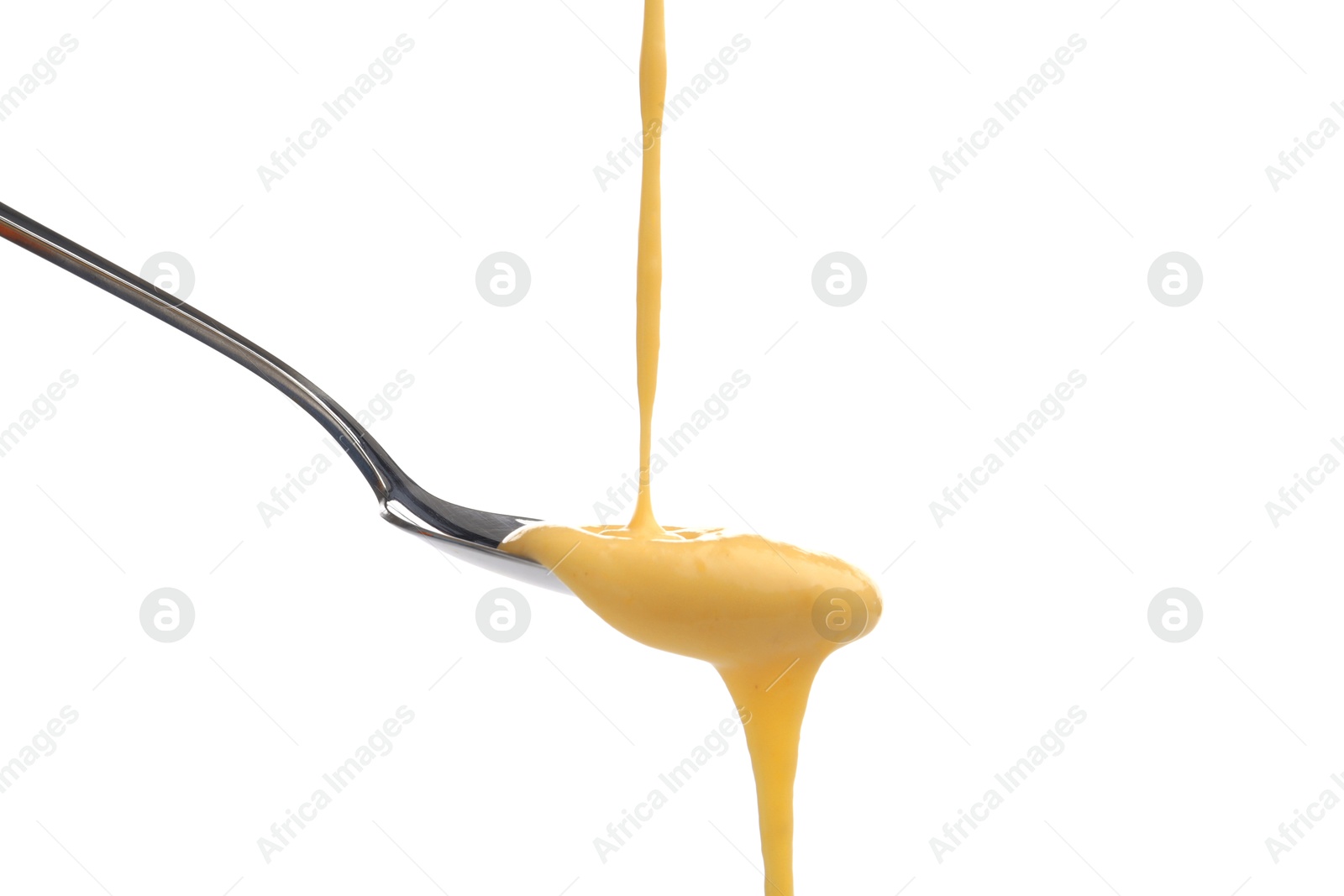 Photo of Delicious melted cheese flowing down onto spoon isolated on white