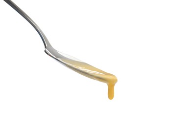 Photo of Delicious melted cheese flowing down from spoon isolated on white