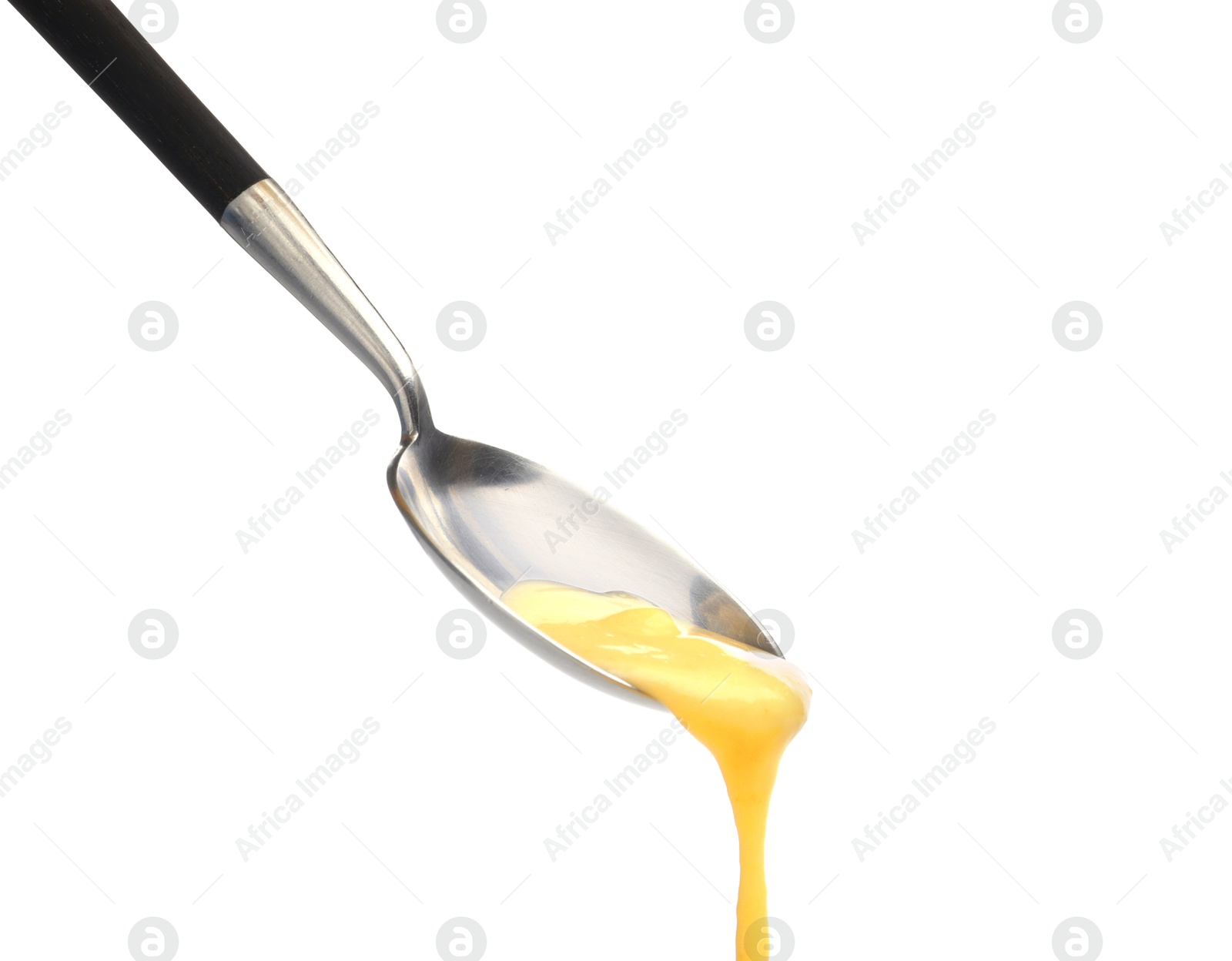 Photo of Delicious melted cheese flowing down from spoon isolated on white