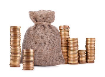 Image of Wealth. Stacked coins and burlap bag isolated on white