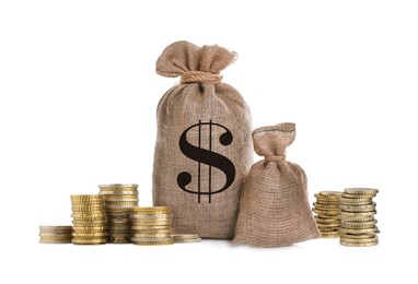 Image of Wealth. Stacked coins and burlap bags isolated on white