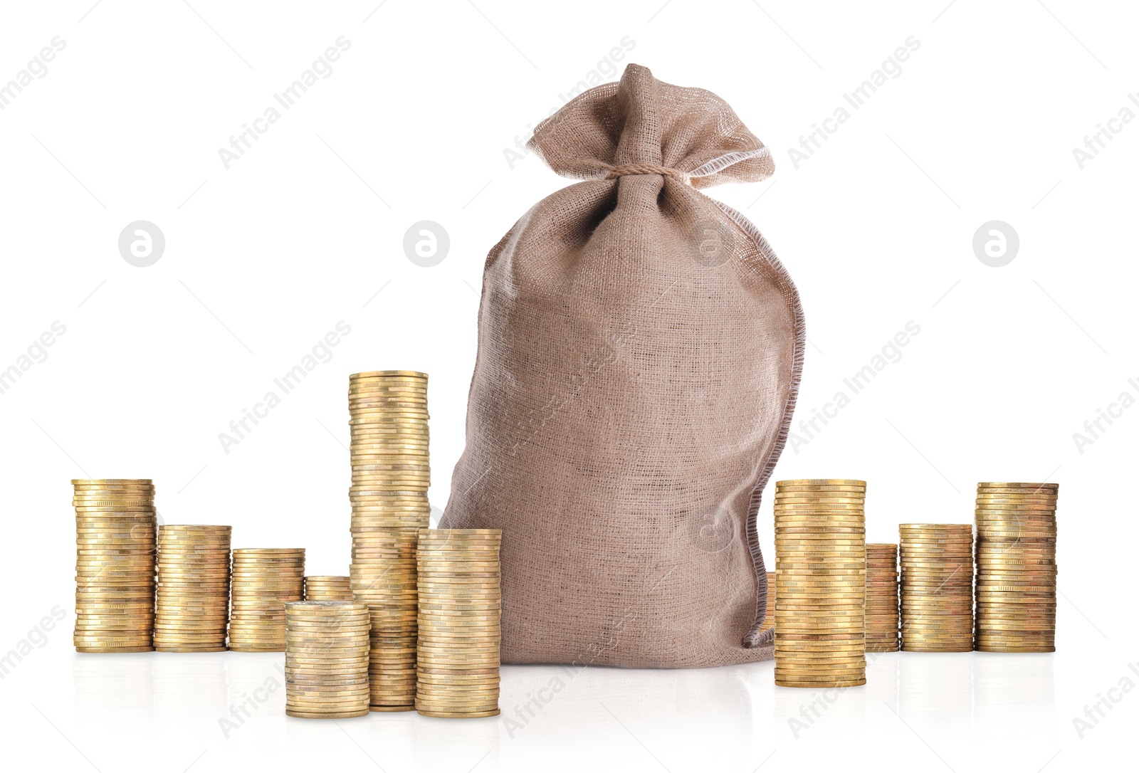 Wealth. Stacked coins and burlap bag isolated on white Image of Wealth. Stacked coins and burlap bag isolated on white