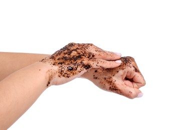 Photo of Woman applying body scrub onto her hands on white background, closeup