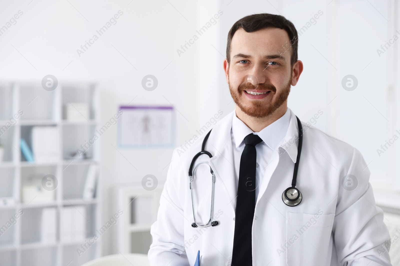 Portrait of professional doctor with stethoscope in hospital. Space for text Photo of Portrait of professional doctor with stethoscope in hospital. Space for text
