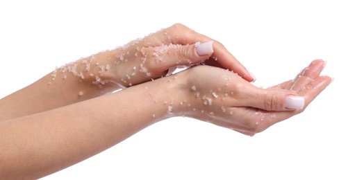 Photo of Woman applying body scrub onto her hands on white background, closeup