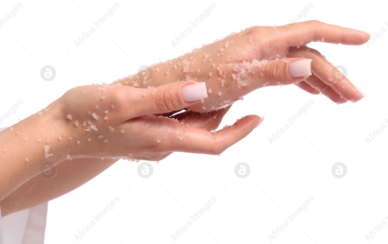 Woman applying body scrub onto her hands on white background, closeup Photo of Woman applying body scrub onto her hands on white background, closeup