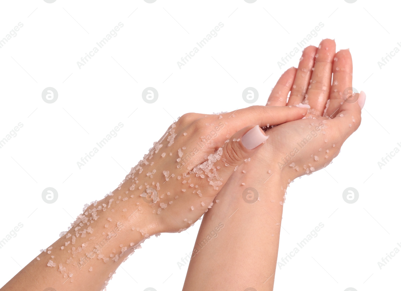 Woman applying body scrub onto her hands on white background, closeup Photo of Woman applying body scrub onto her hands on white background, closeup