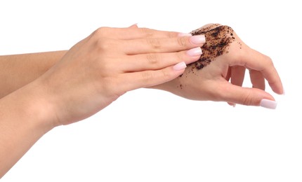 Photo of Woman applying body scrub onto her hands on white background, closeup