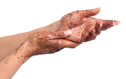 Photo of Woman applying body scrub onto her hands on white background, closeup