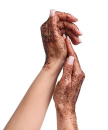 Photo of Woman applying body scrub onto her hands on white background, closeup