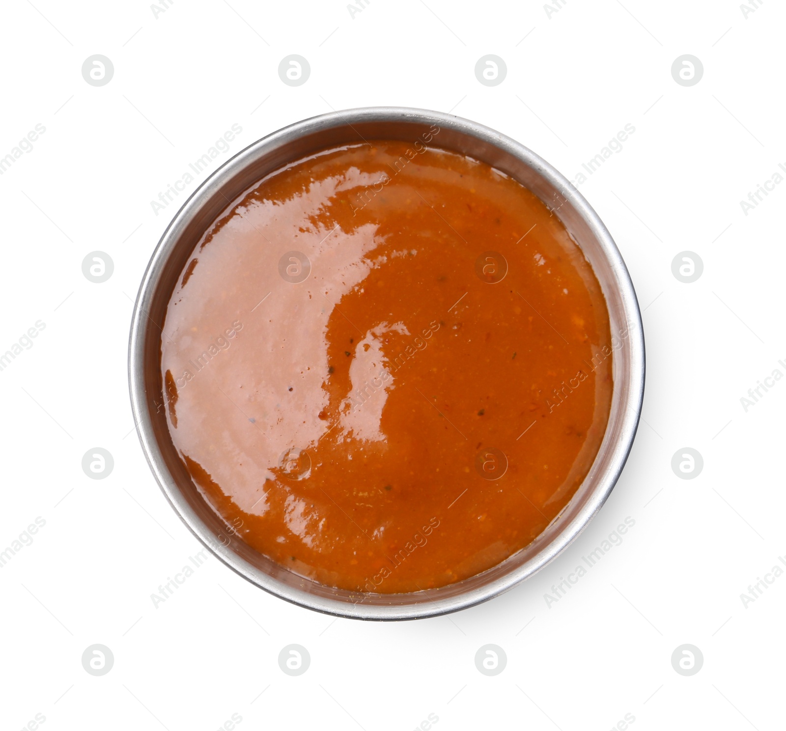 Tasty curry sauce in metal dish isolated on white, top view Photo of Tasty curry sauce in metal dish isolated on white, top view
