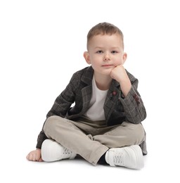 Photo of Portrait of cute little boy on white background