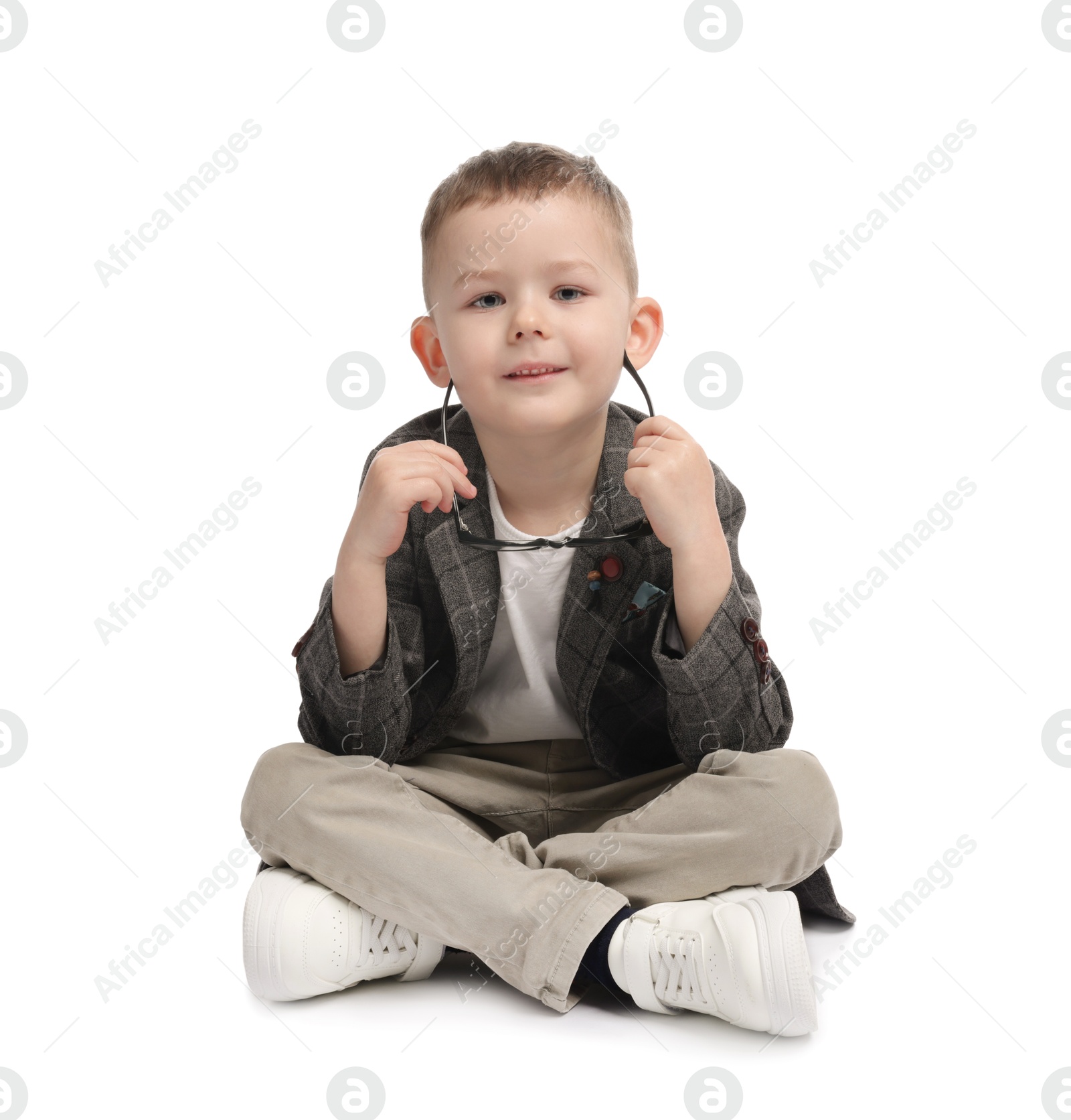 Cute little boy with glasses on white background Photo of Cute little boy with glasses on white background
