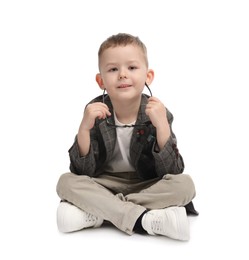 Photo of Cute little boy with glasses on white background