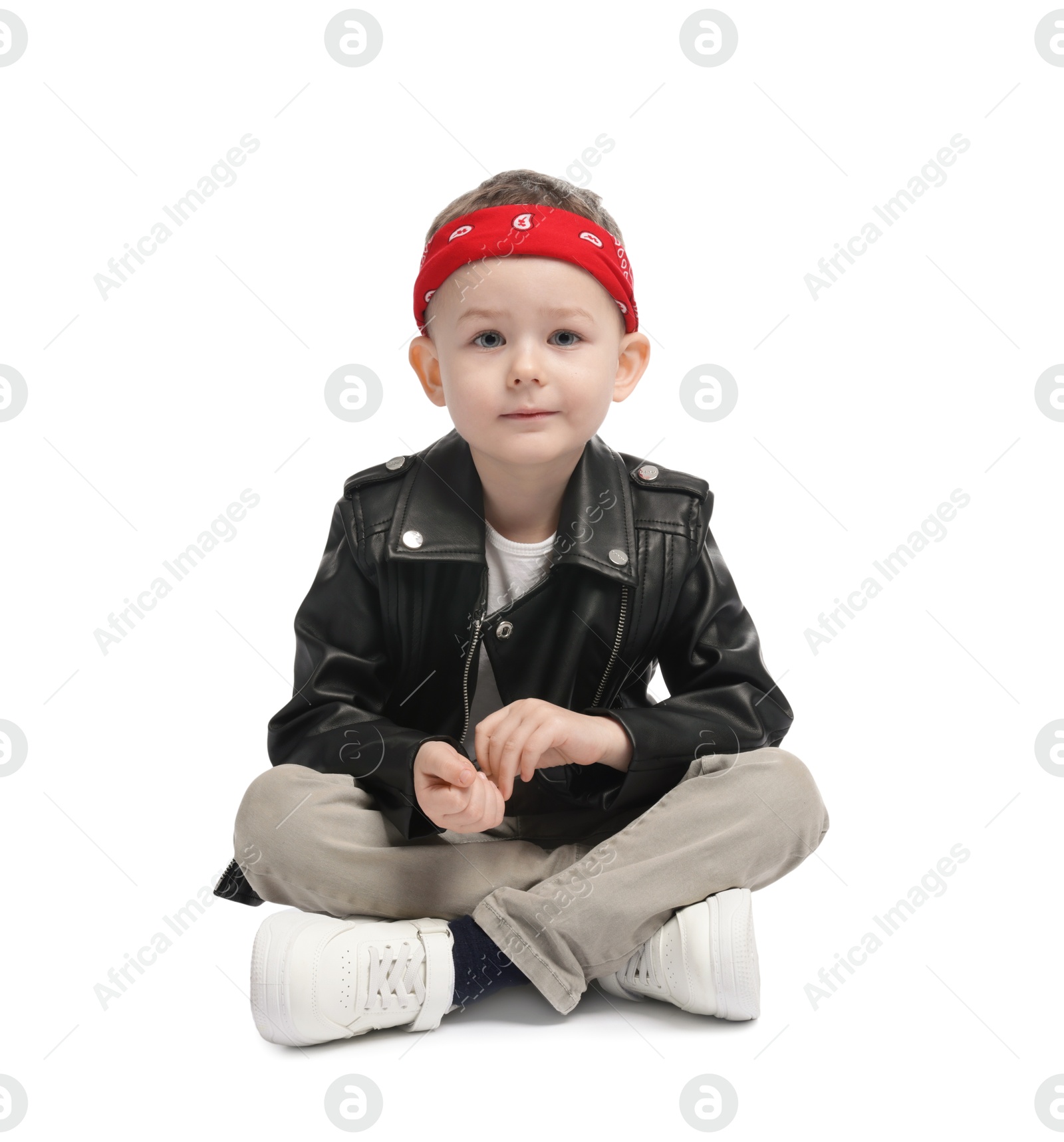 Cute little boy in black leather jacket on white background Photo of Cute little boy in black leather jacket on white background