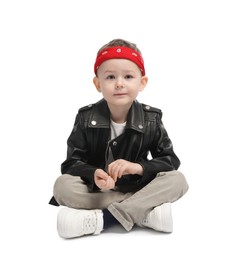 Photo of Cute little boy in black leather jacket on white background