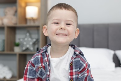Photo of Portrait of cute little boy at home