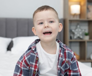 Photo of Portrait of cute little boy at home