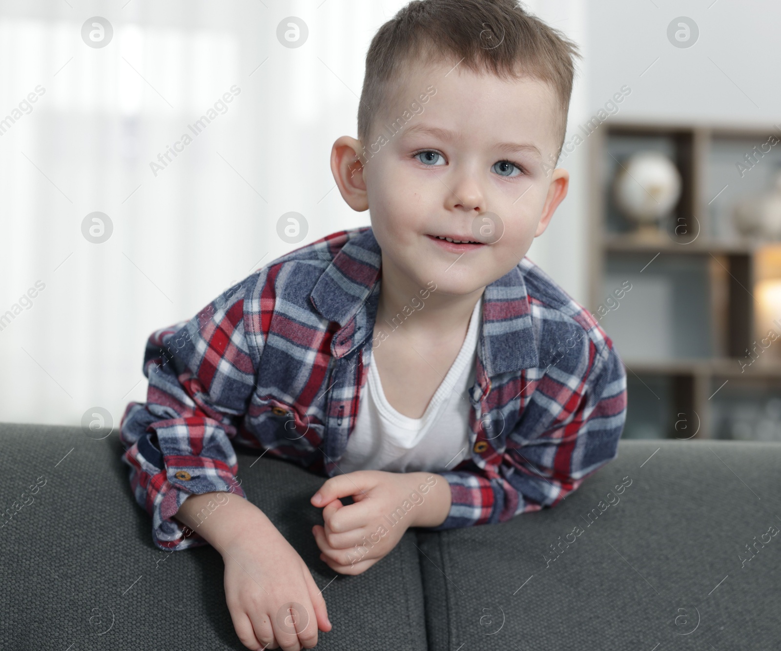 Portrait of cute little boy at home Photo of Portrait of cute little boy at home