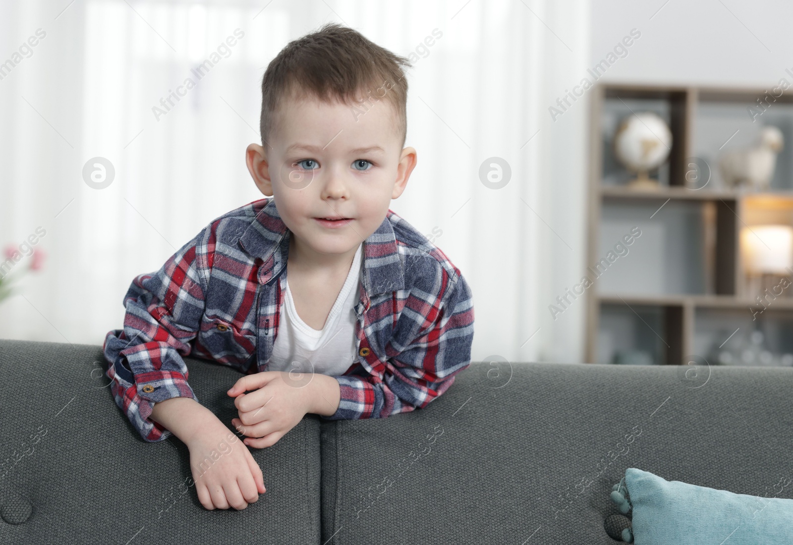 Portrait of cute little boy at home Photo of Portrait of cute little boy at home