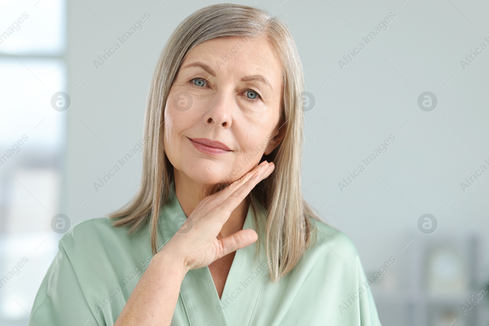 Portrait of woman with healthy skin at home Photo of Portrait of woman with healthy skin at home
