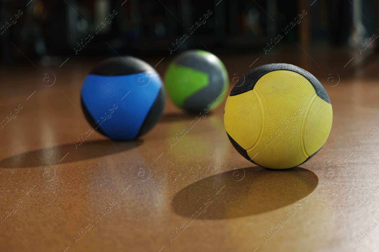 Different medicine balls on floor in gym Photo of Different medicine balls on floor in gym