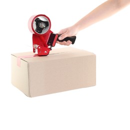 Photo of Woman using dispenser with adhesive tape to seal cardboard box on white background, closeup