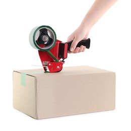 Photo of Woman using dispenser with adhesive tape to seal cardboard box on white background, closeup
