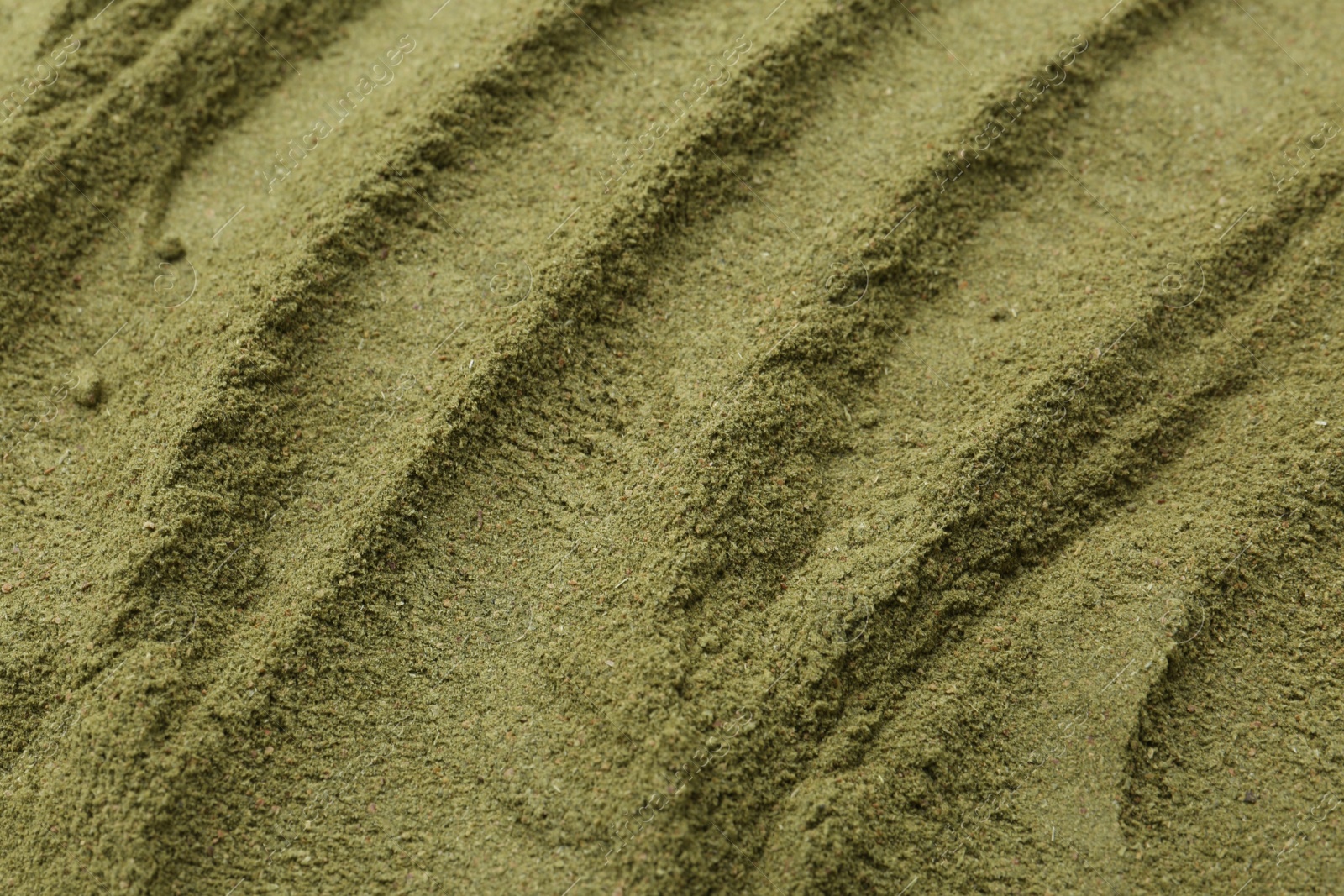 Superfood. Green onion powder as background, closeup Photo of Superfood. Green onion powder as background, closeup