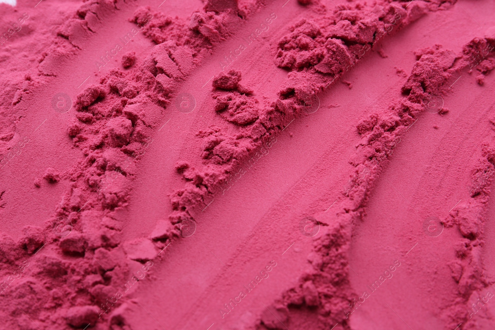 Superfood supplement. Acai powder as background, closeup Photo of Superfood supplement. Acai powder as background, closeup