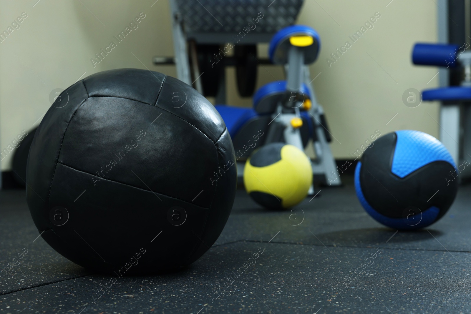 Different medicine balls on floor in gym Photo of Different medicine balls on floor in gym