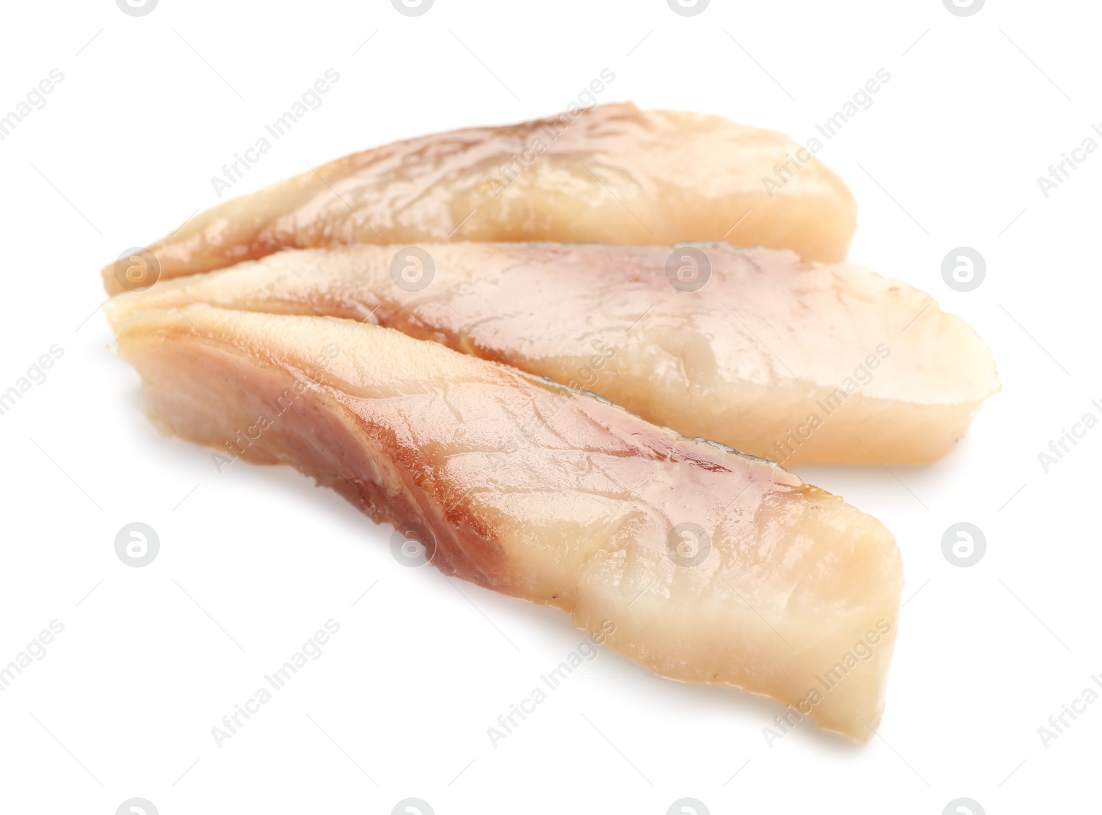 Pieces of delicious herring isolated on white Photo of Pieces of delicious herring isolated on white