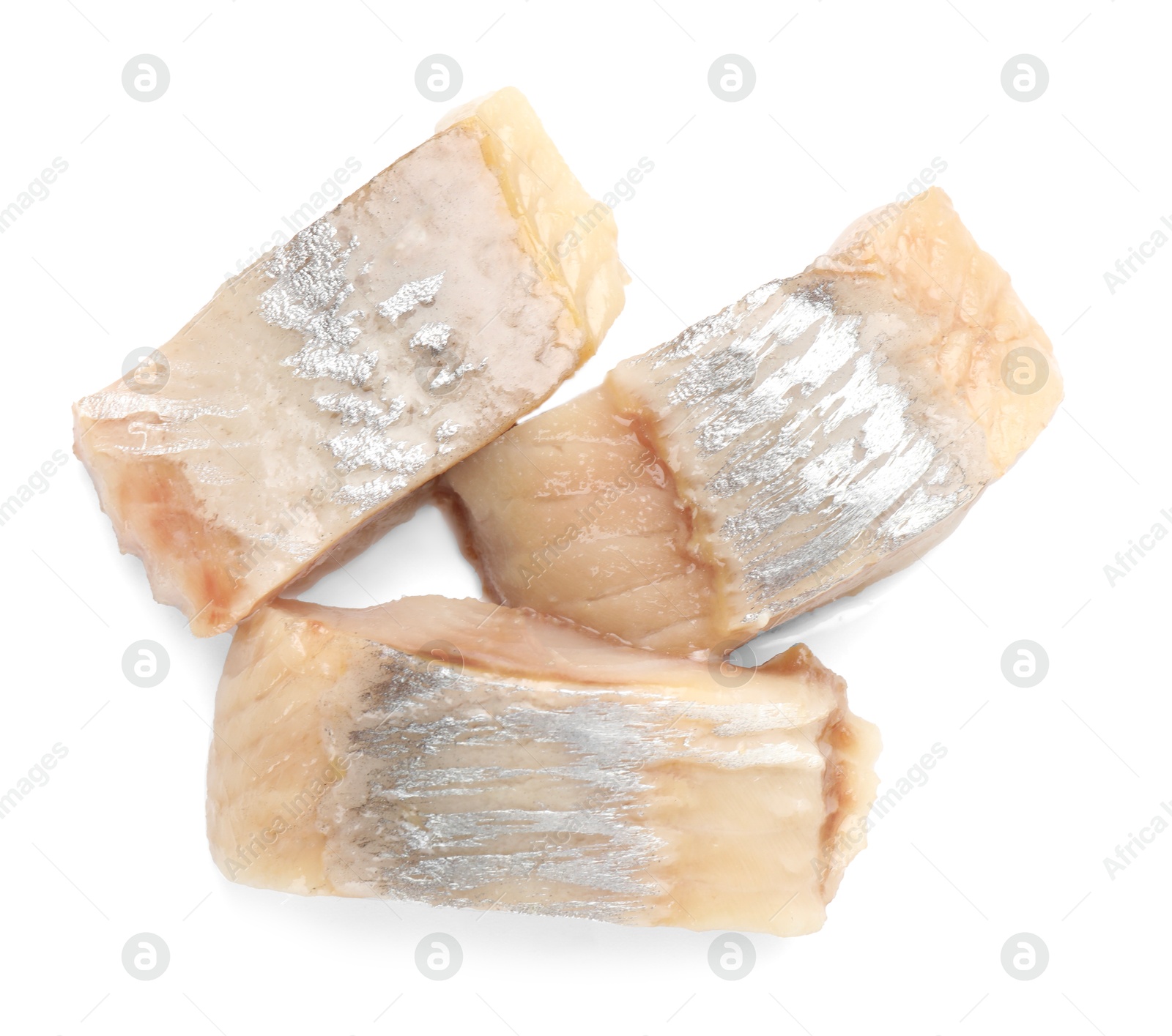 Pieces of delicious herring isolated on white, top view Photo of Pieces of delicious herring isolated on white, top view
