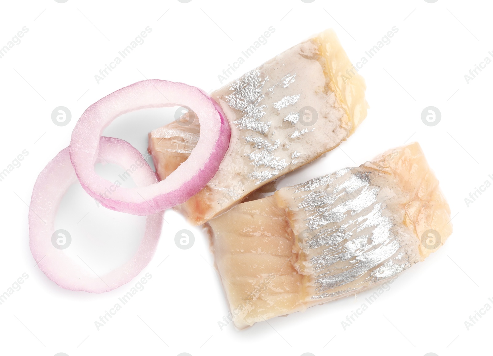 Pieces of delicious herring with onions isolated on white, top view Photo of Pieces of delicious herring with onions isolated on white, top view