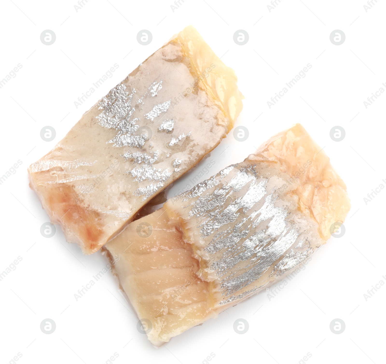 Pieces of delicious herring isolated on white, top view Photo of Pieces of delicious herring isolated on white, top view