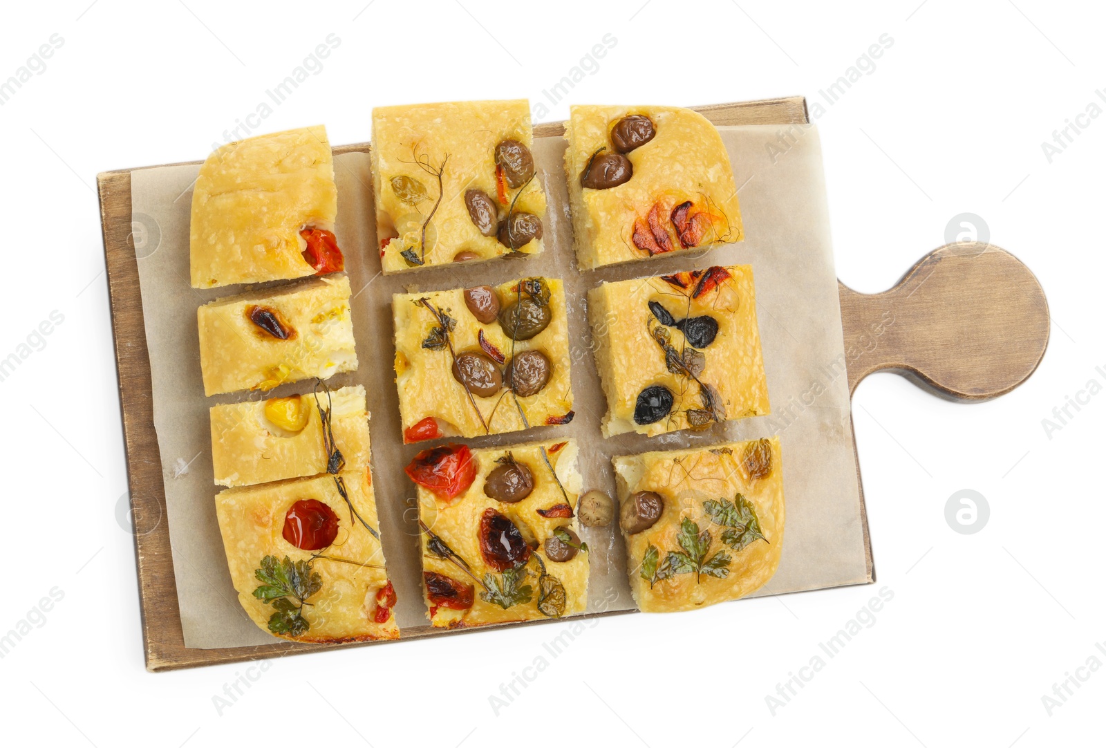 Cut delicious focaccia with flowers made of vegetables isolated on white, top view Photo of Cut delicious focaccia with flowers made of vegetables isolated on white, top view