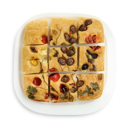 Photo of Cut delicious focaccia with flowers made of vegetables isolated on white, top view