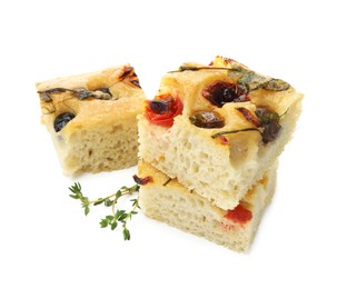 Photo of Pieces of delicious focaccia isolated on white