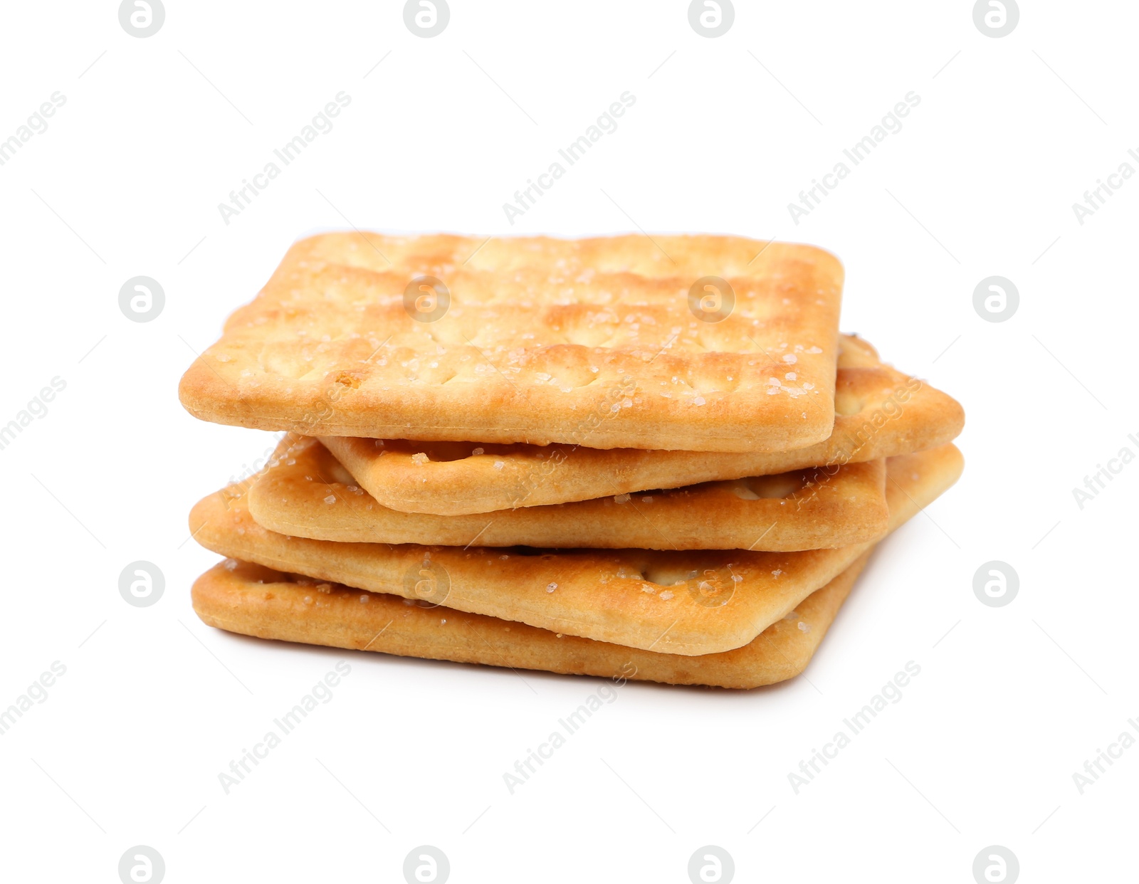 Stack of tasty salty crackers isolated on white Photo of Stack of tasty salty crackers isolated on white